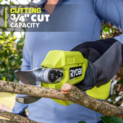 RYOBI pruner cutting a small branch demonstrating clean 3/4 inch cut