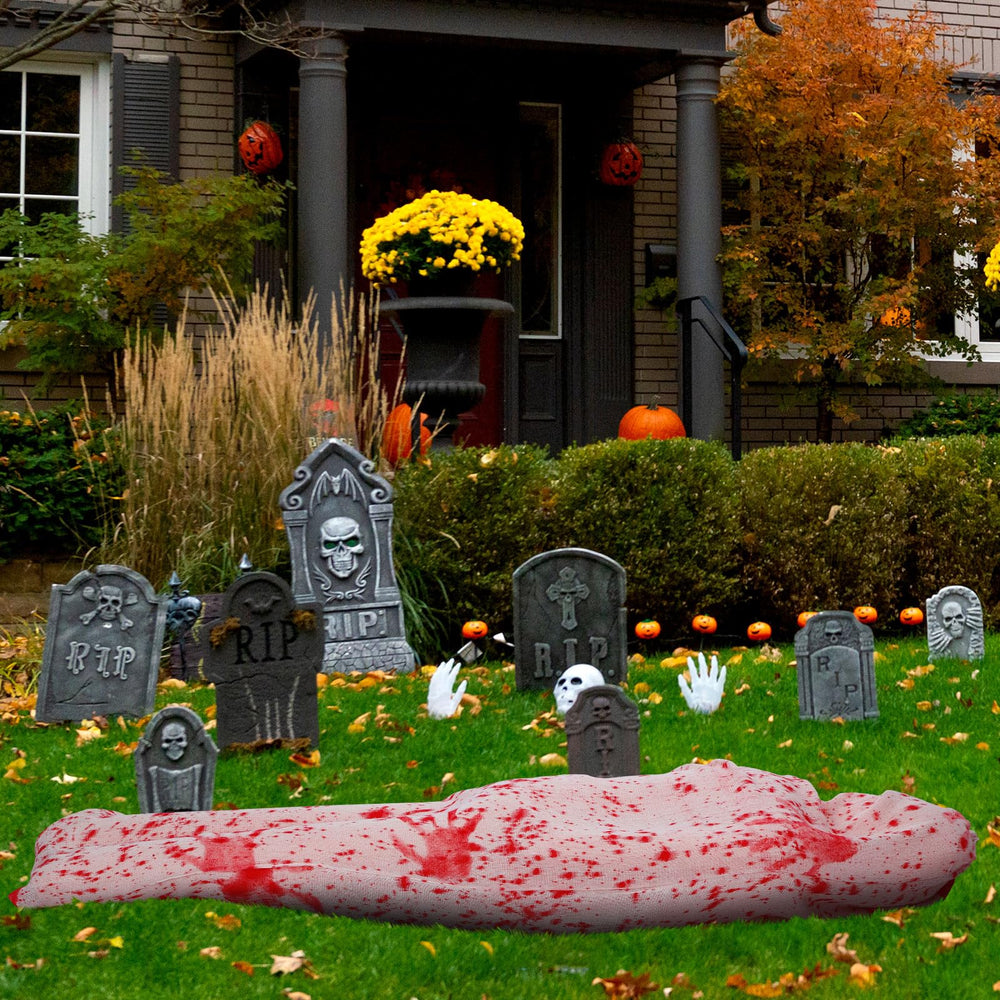 Sadnyy yard night scene with multiple bags creating immersive haunted ambiance