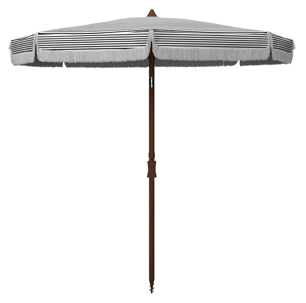 SAFAVIEH close-up of fringe trim highlighting decorative detail and vintage-inspired style