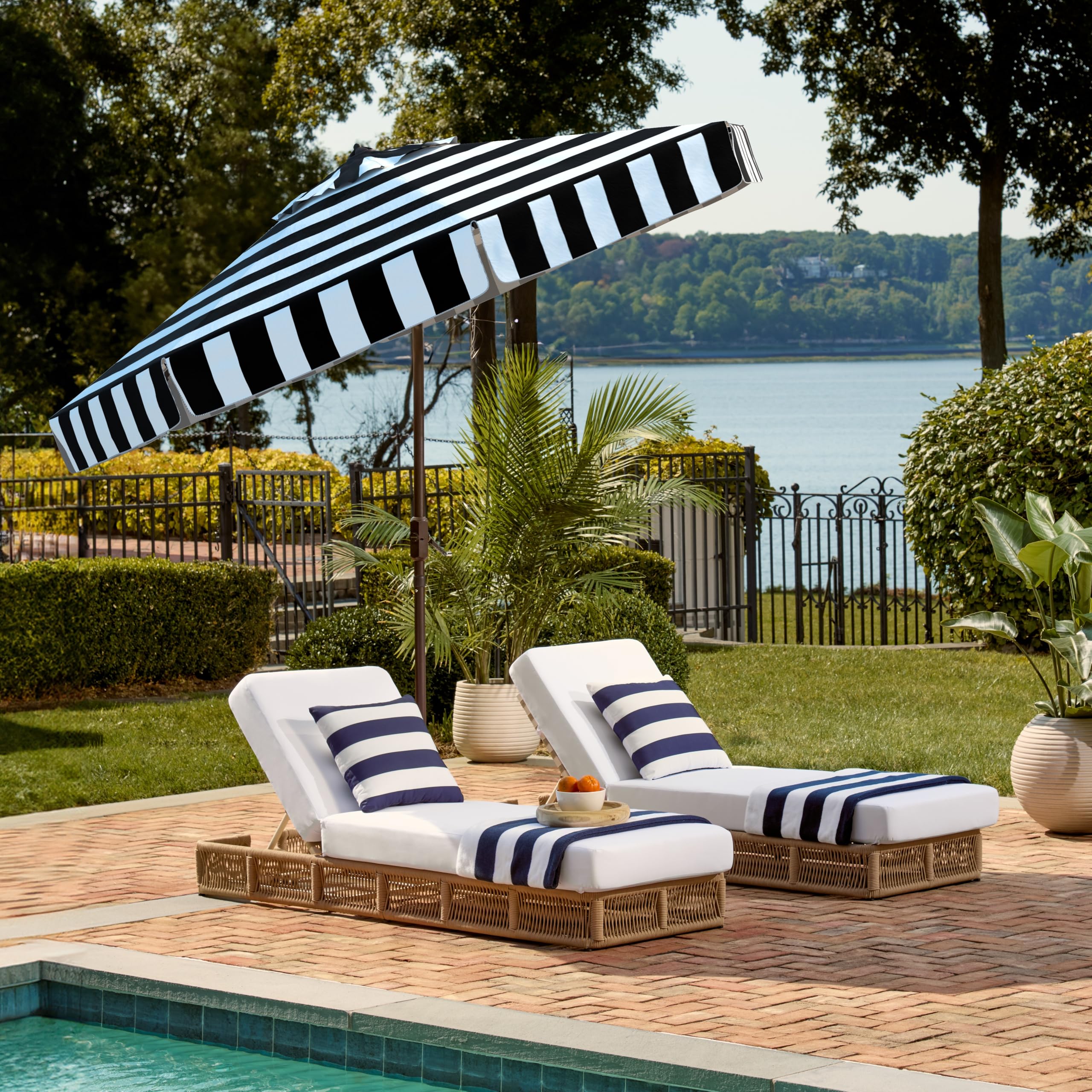 SAFAVIEH Elsa beside chairs showing nine-foot canopy for clear size reference