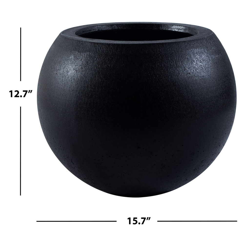 SAFAVIEH Kenslia on patio creating a stylish outdoor focal point