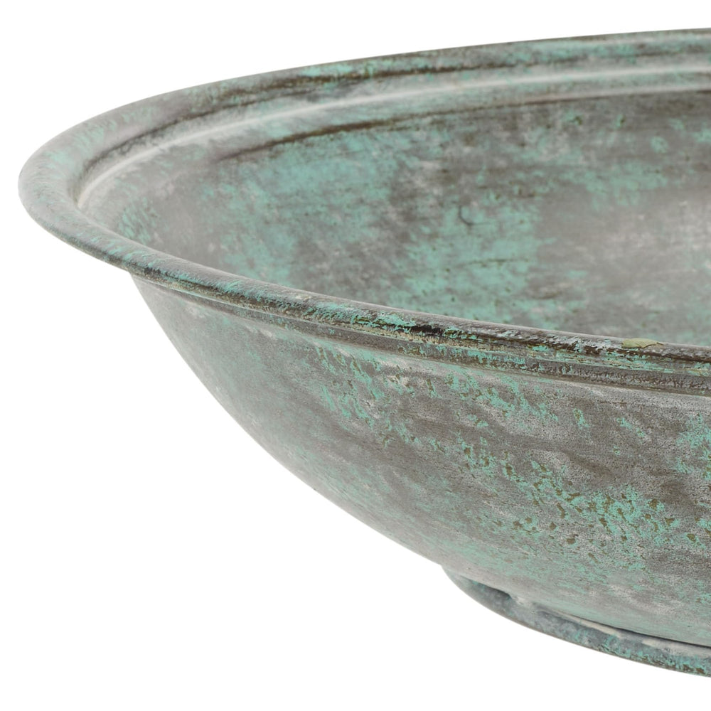 SAFAVIEH bird bath beside a hand for scale showing compact 22-inch height