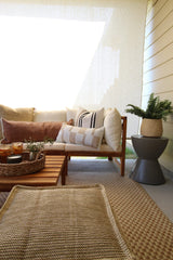 SAFAVIEH runner placed on patio showing weather resistance and stylish benefit