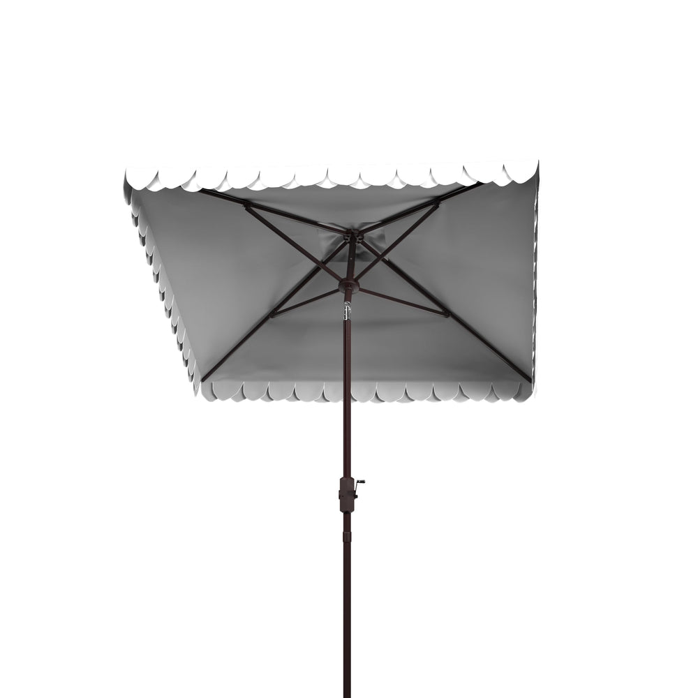 SAFAVIEH umbrella over patio set showing shade coverage and outdoor style