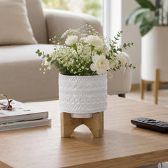 Sagebrook Home planter front view showing white tribal design and elegant silhouette for decor