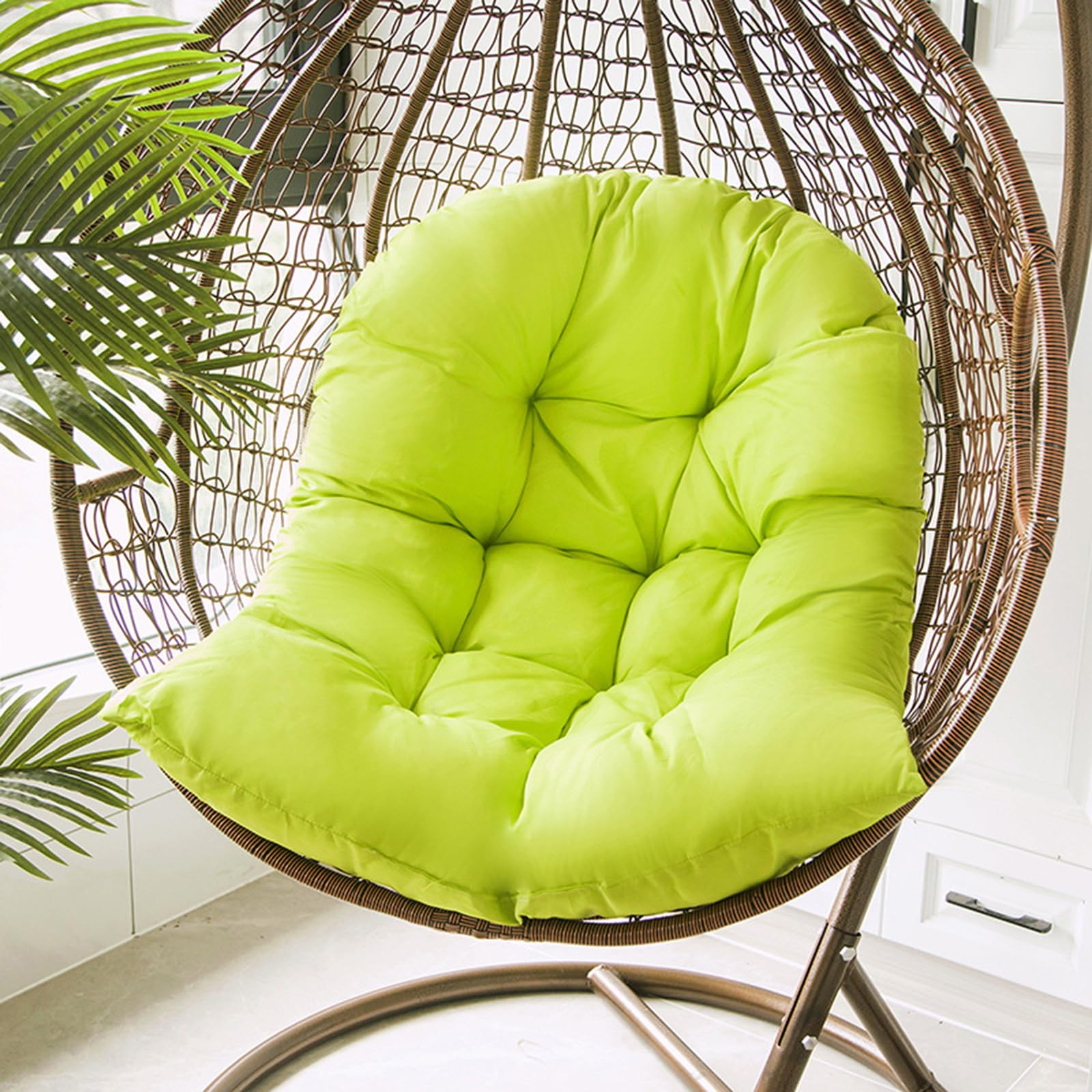 Samtiny on a porch swing in lifestyle shot suggesting cozy outdoor relaxation