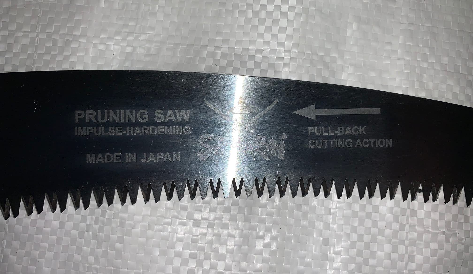 Samurai Kanzawa Ichigeki secured in plastic sheath with detachable belt clip for safe carry