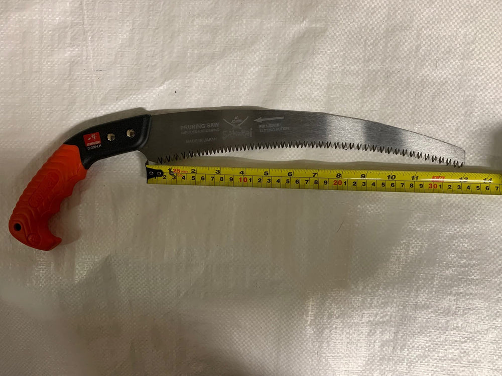 Samurai Kanzawa Ichigeki used in yard setting showing professional-grade pruning convenience