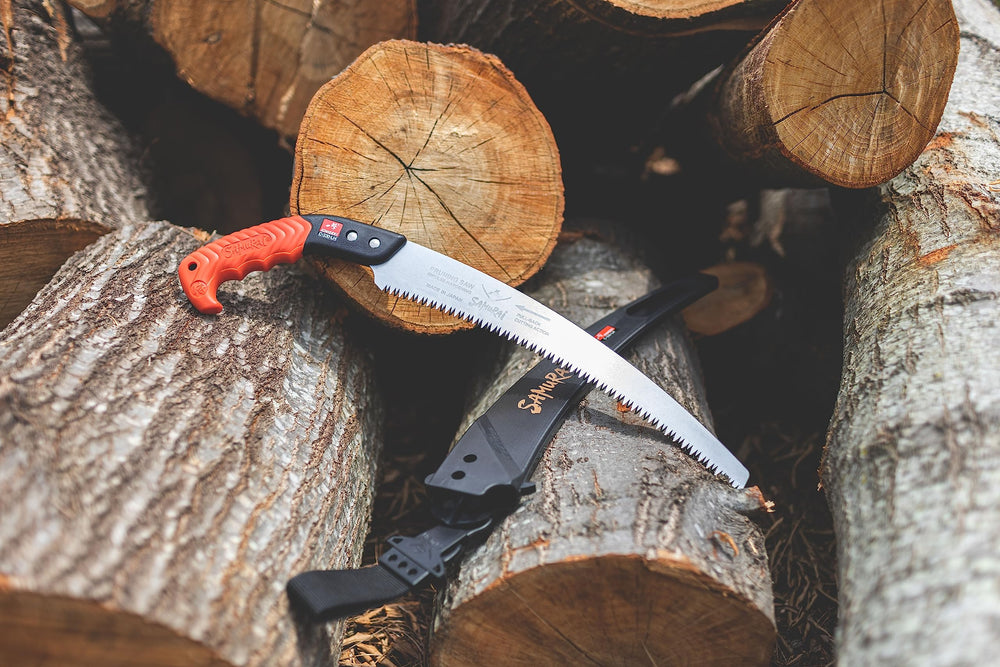SAMURAI saw cutting a branch in use demonstrating smooth pull-stroke cutting efficiency