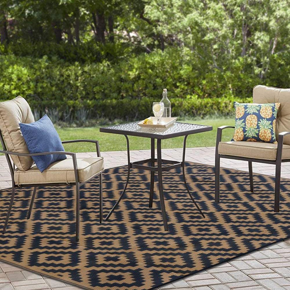 SAND MINE corner loop with stake securing rug and preventing wind lift