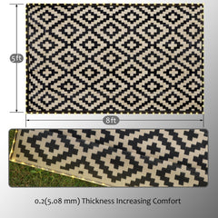 SAND MINE outdoor rug on backyard deck lit at dusk creating cozy evening atmosphere