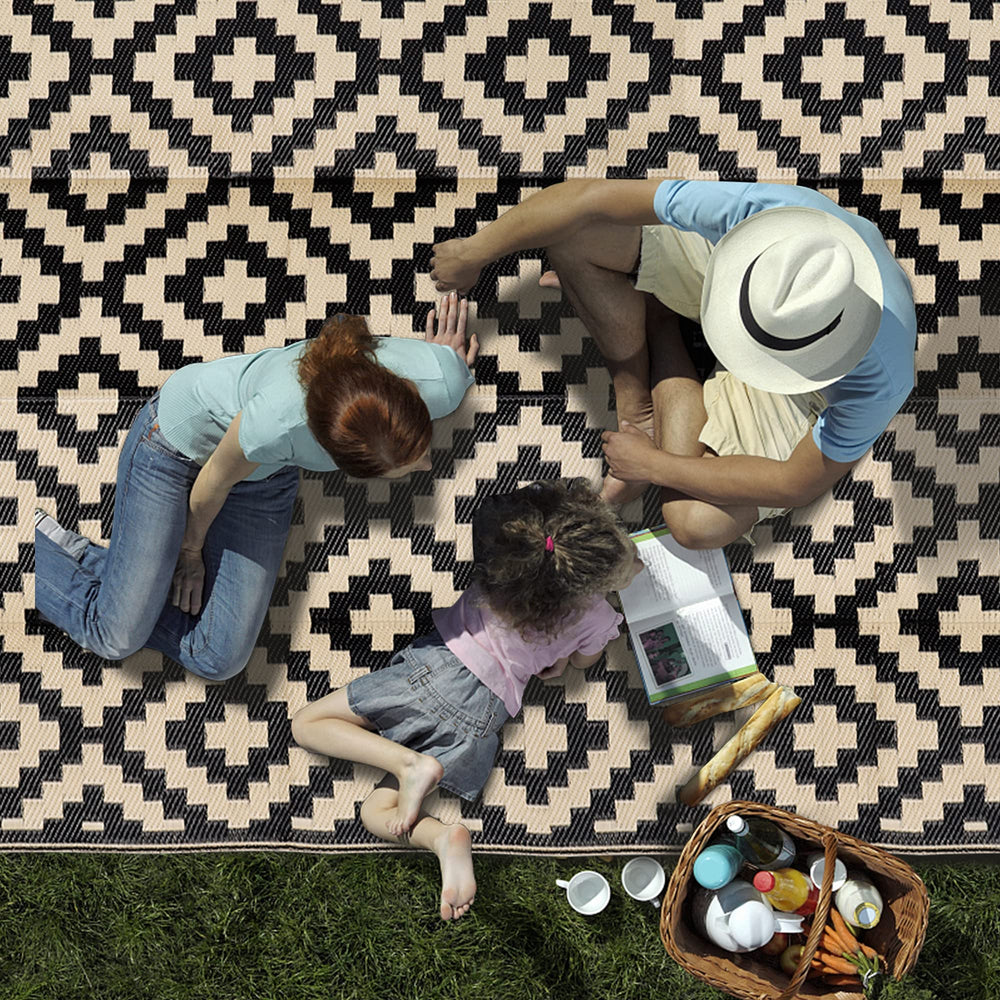 SAND MINE rug laid on RV patio providing a comfortable outdoor living area