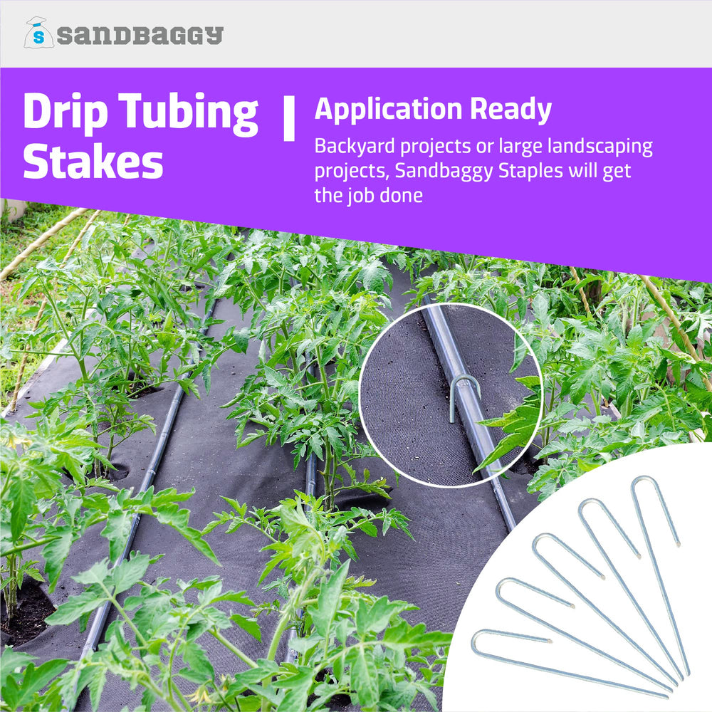 Sandbaggy stakes installed in garden bed securing tubing, keeps irrigation organized