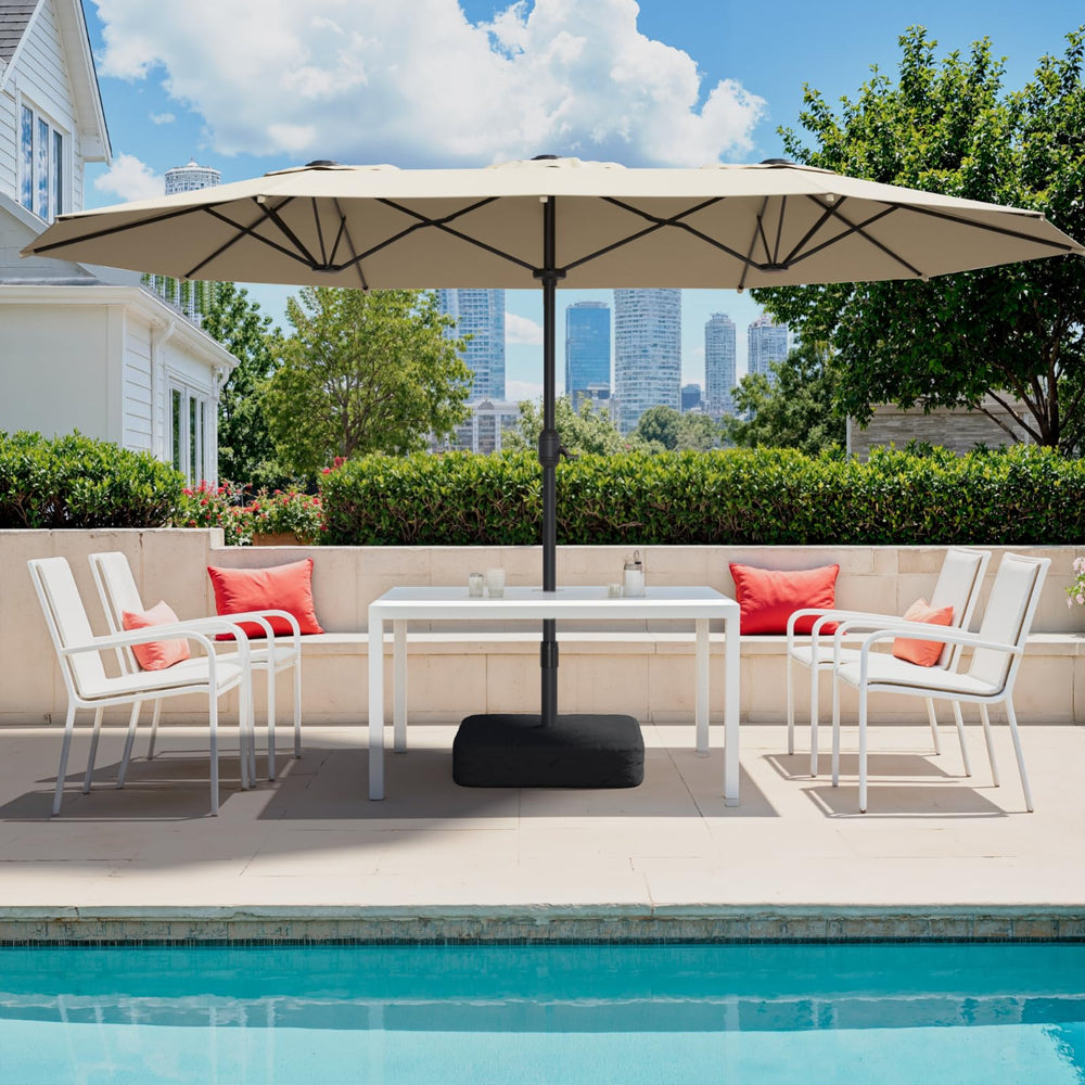 Sannwsg umbrella next to chair to show 15ft scale and coverage clarity