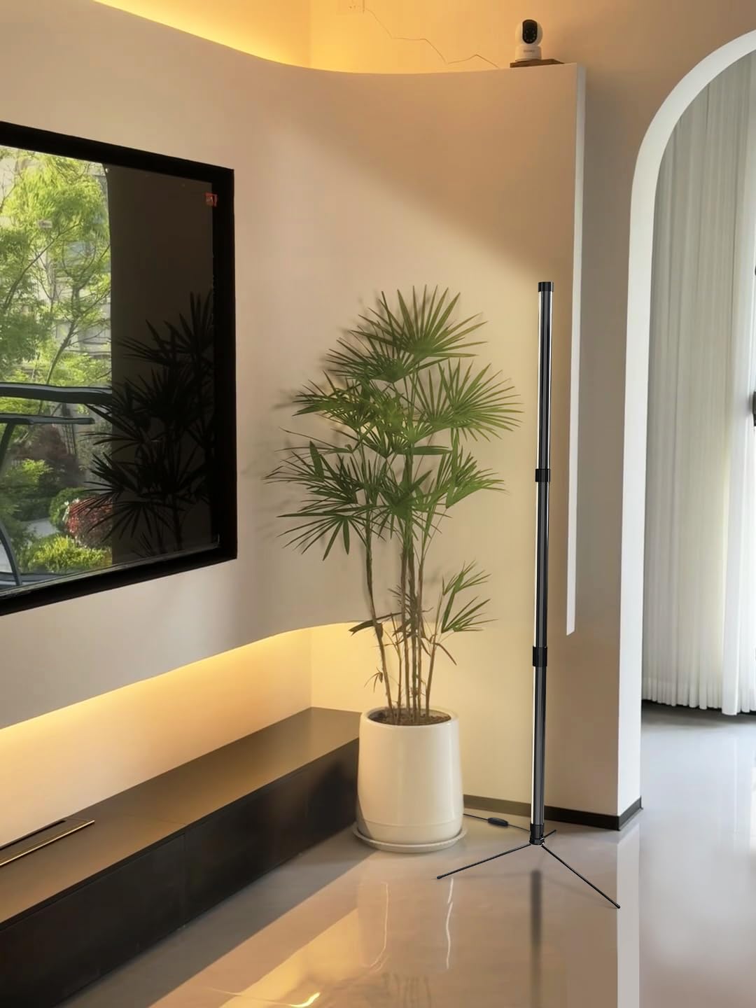 SANSI lifestyle scene in a living room corner showing integrated lighting for plant displays