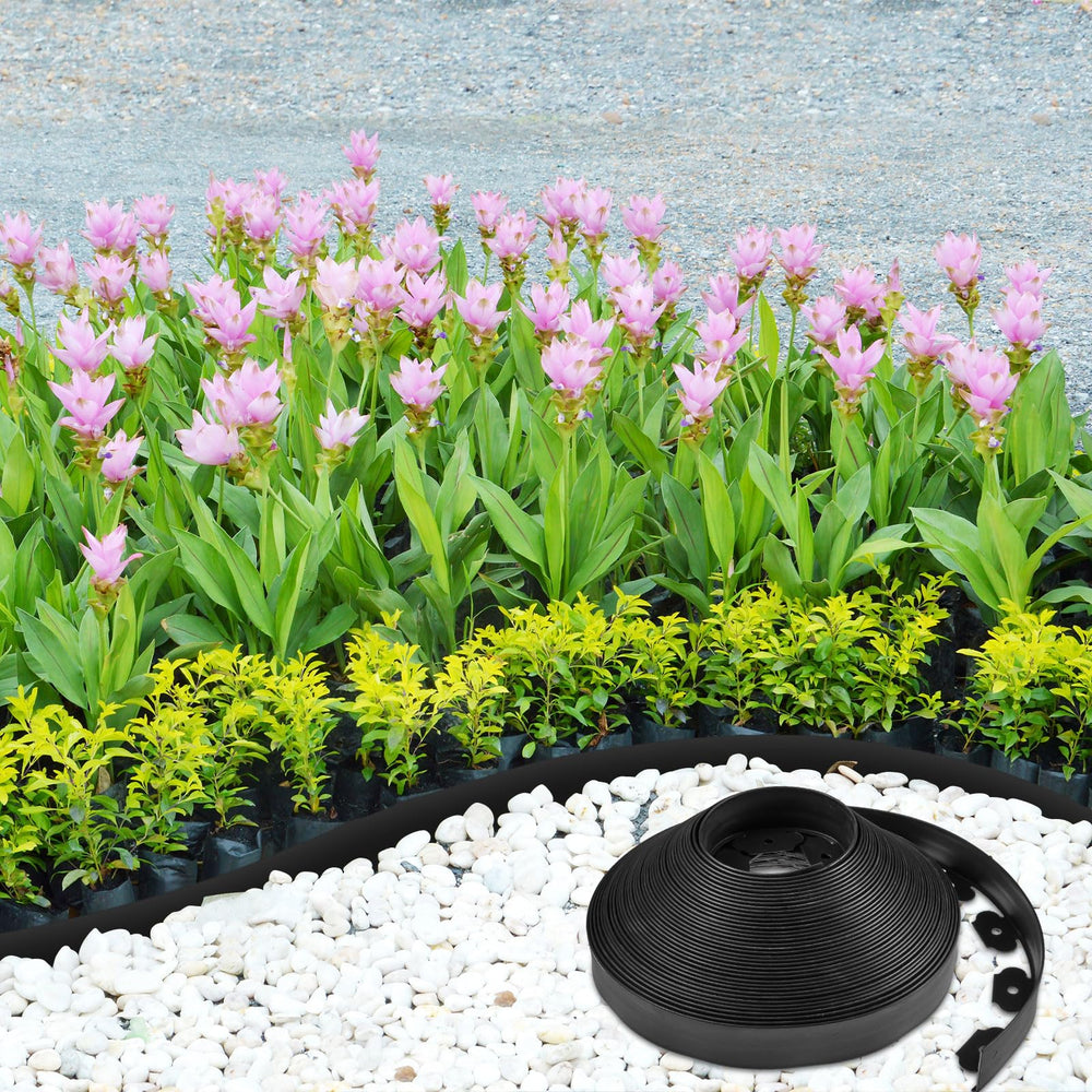 Sasylvia edging installed around curved flower bed showing easy shaping and neat separation benefit