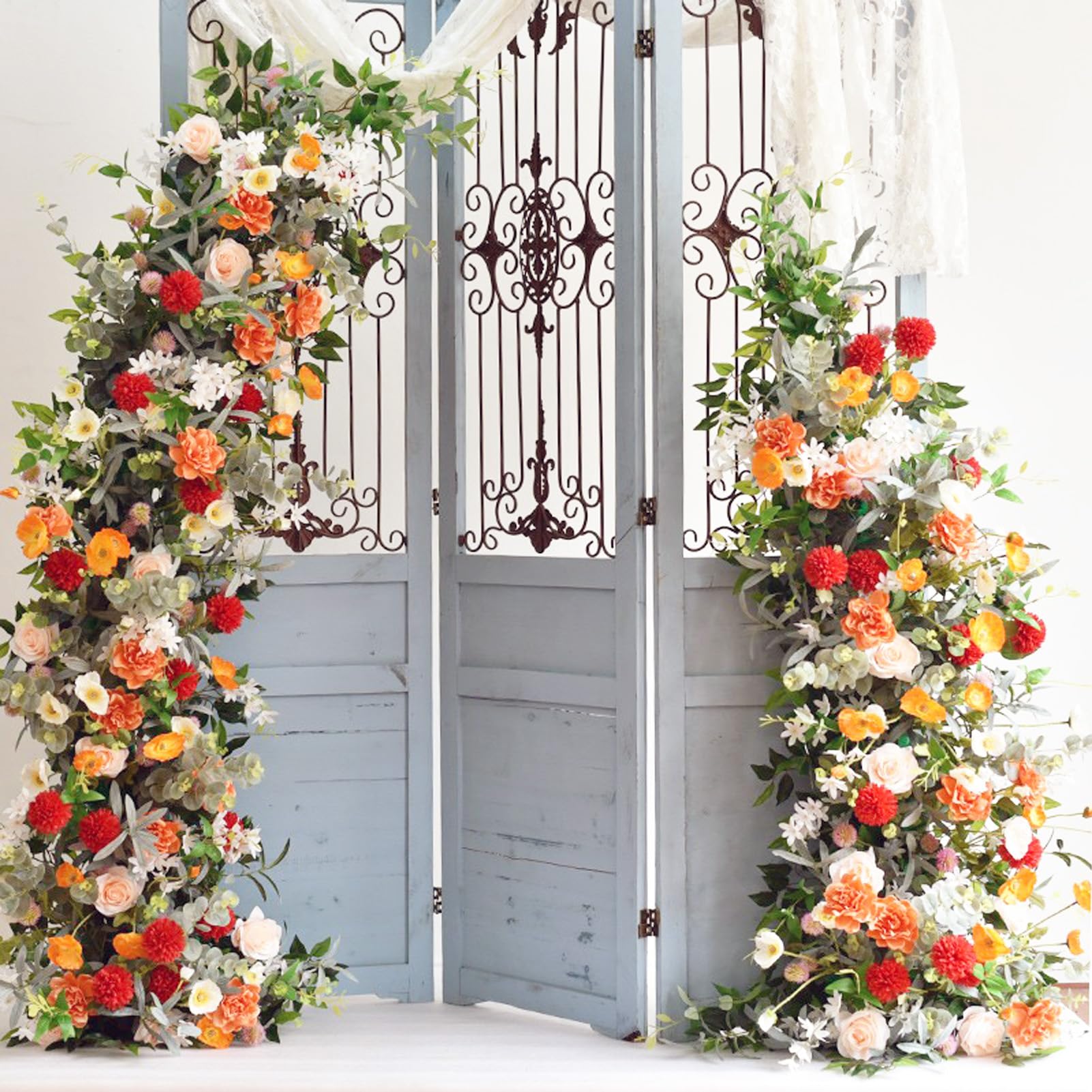 SATBIR arch styled with floral garlands demonstrating decorative styling ideas