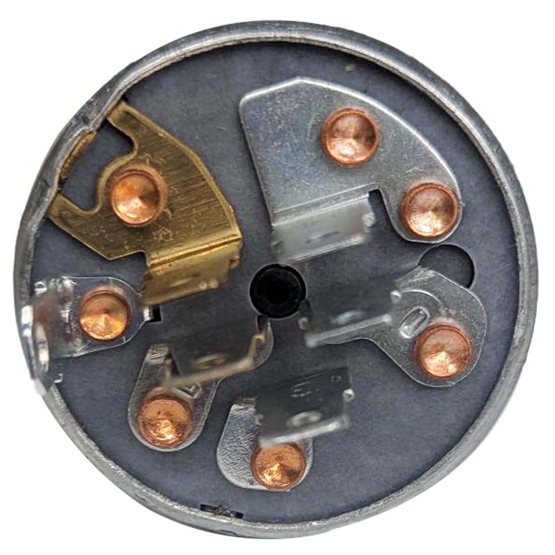 Scag ignition switch with supplied hardware beside a ruler showing installation scale