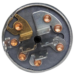 Scag ignition switch with supplied hardware beside a ruler showing installation scale