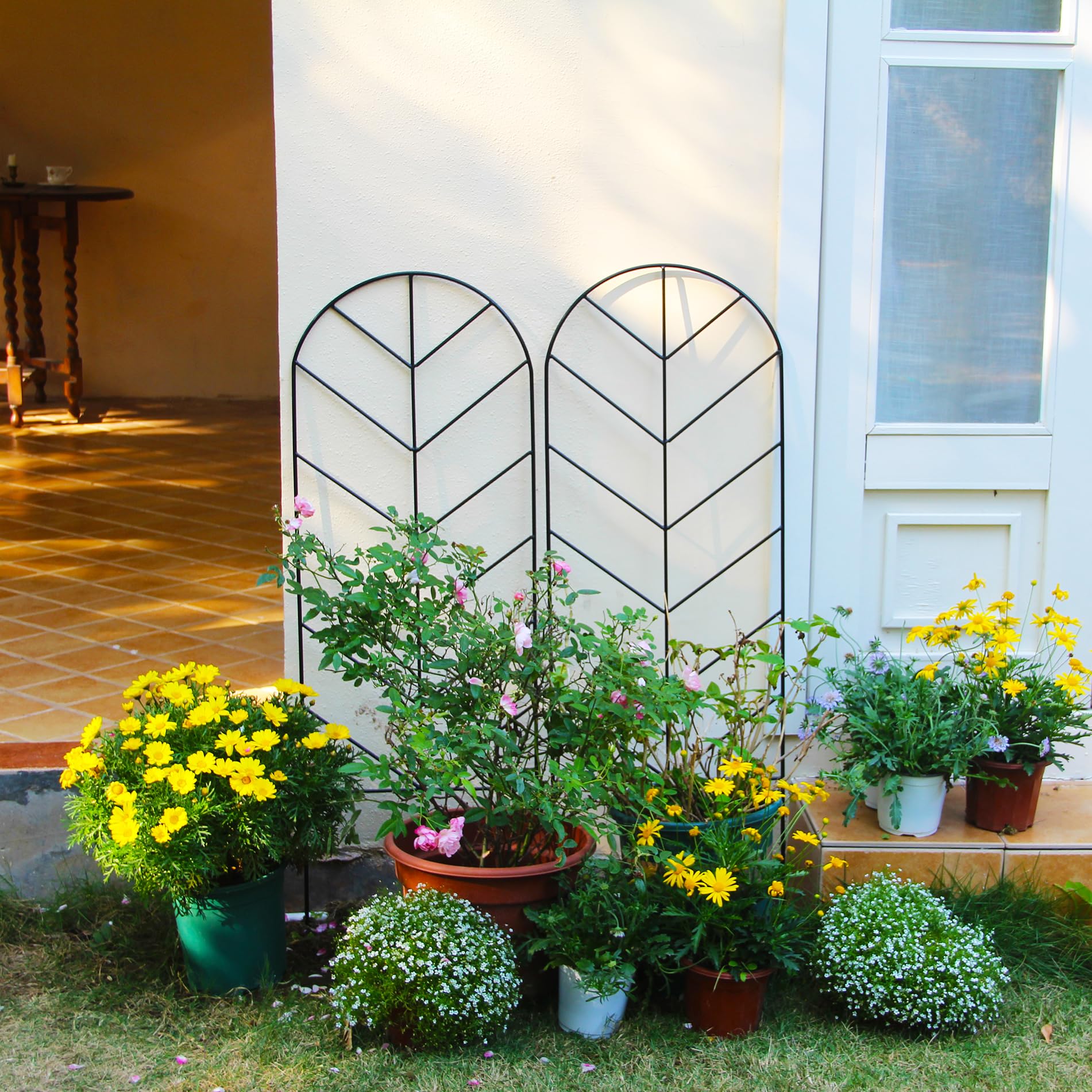 SCENDOR stake inserted in garden soil demonstrating easy installation and stability