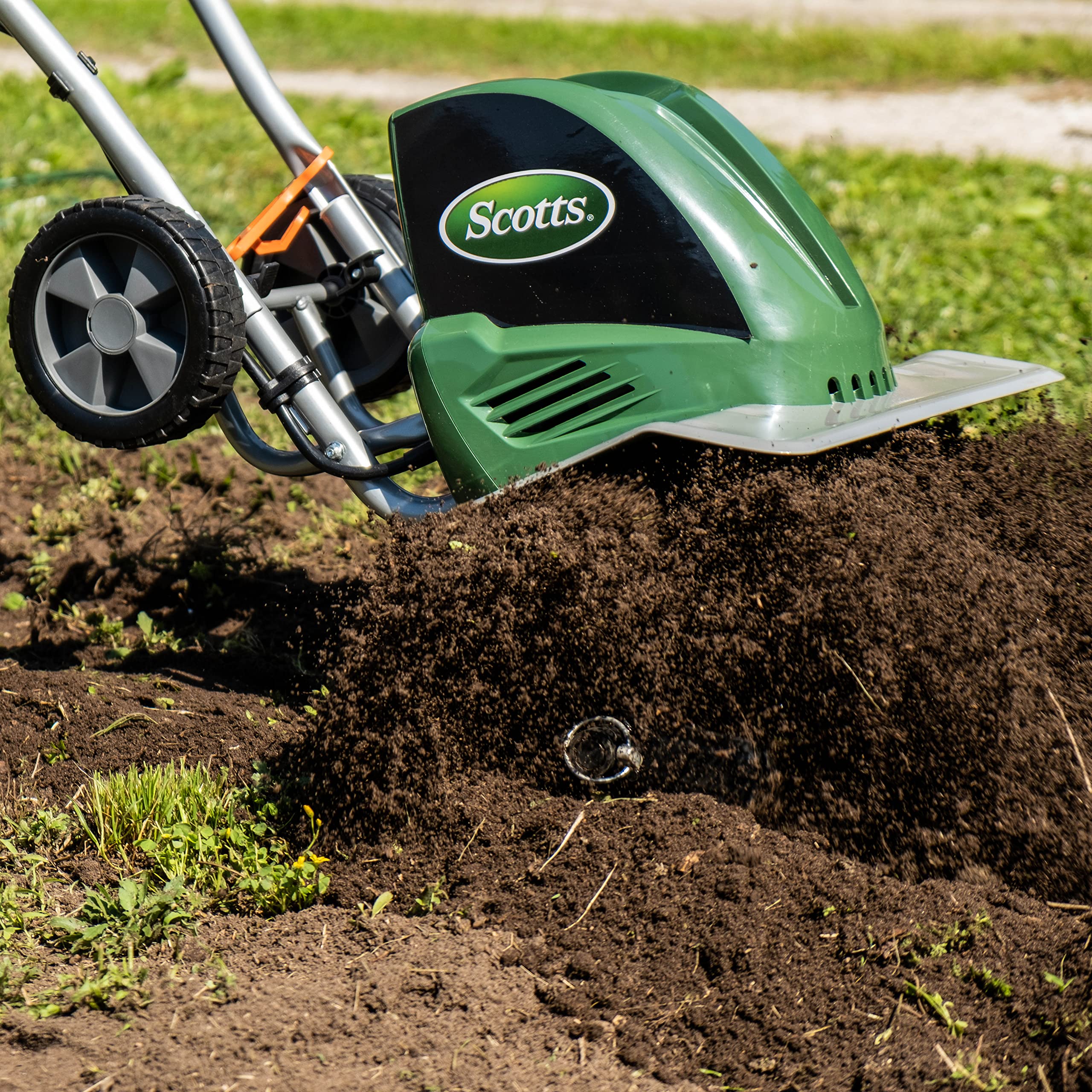 Scotts adjustable width demonstration showing 11 to 16 inch configuration versatility