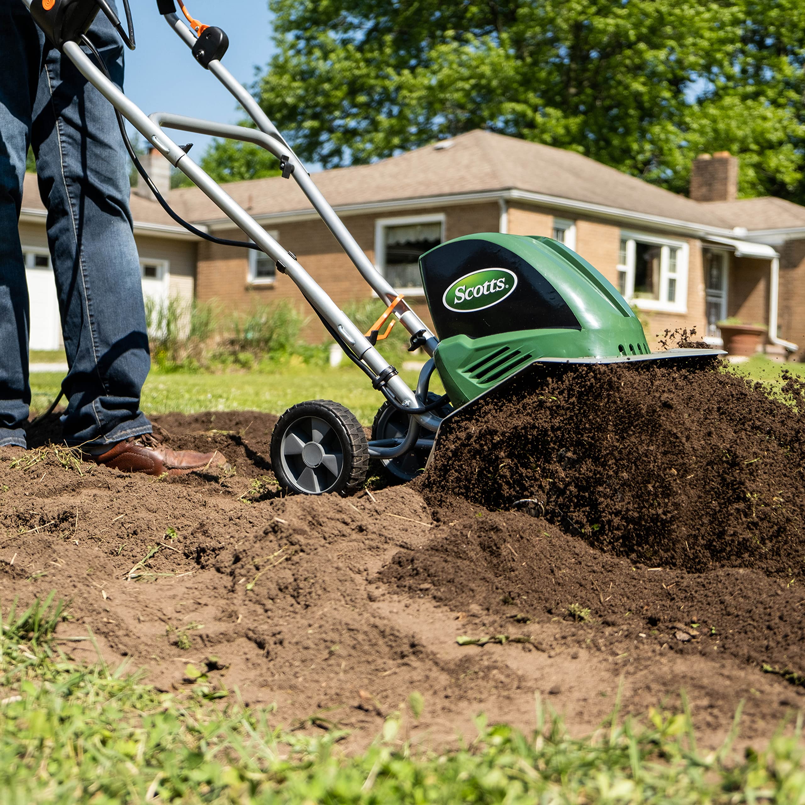 Scotts tiller in action tilling soil to 8 inches for deep aeration benefit