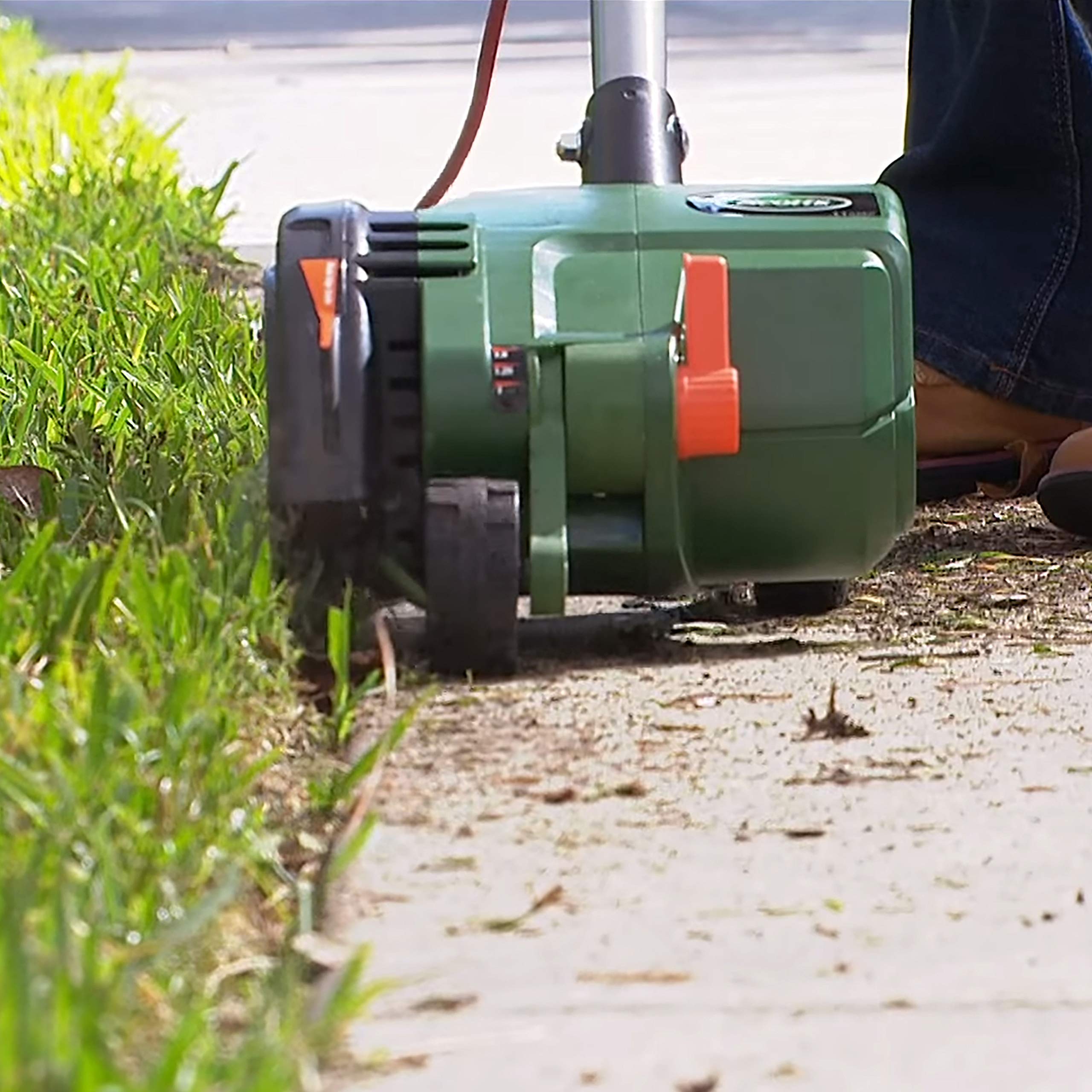 Scotts edger trimming sidewalk edge accurately for cleaner lawn borders