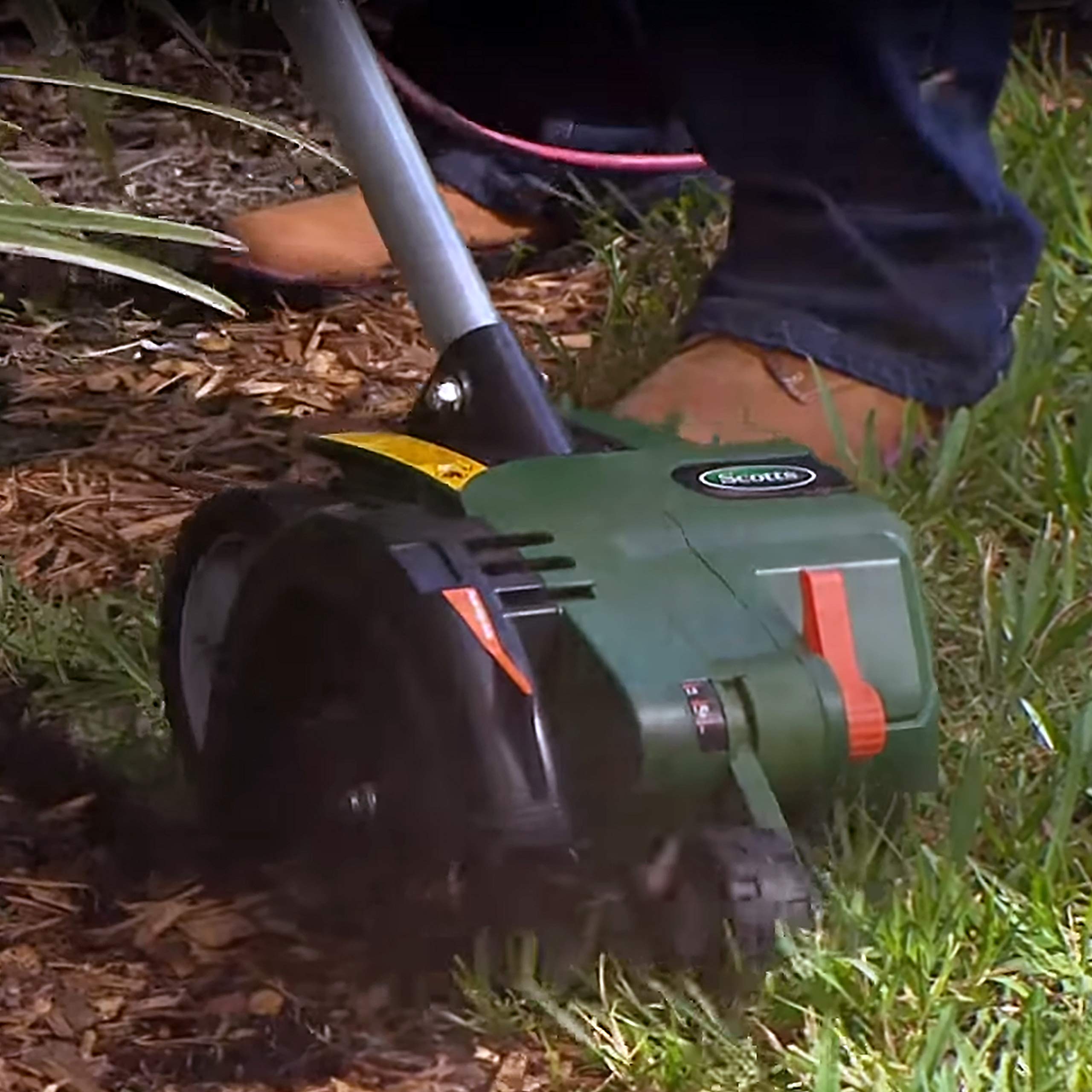 Scotts edger showing three-position blade height for trenching versatility