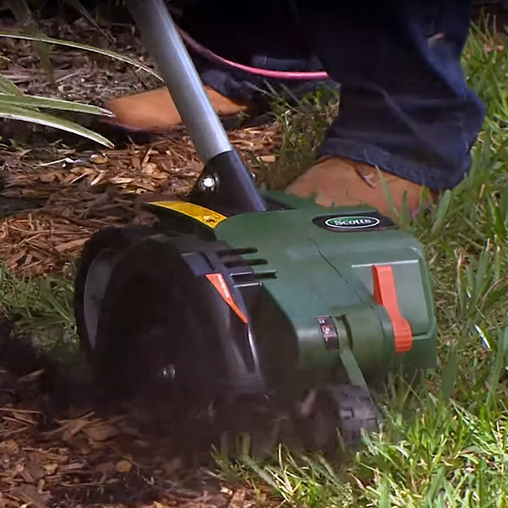 Scotts edger showing three-position blade height for trenching versatility