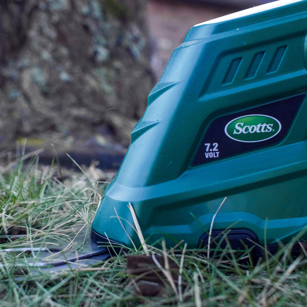 Scotts trimmer in a garden lifestyle setting simplifying yard work