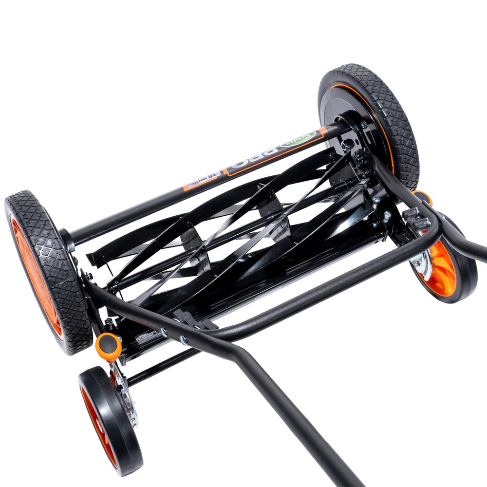 Scotts mower beside a foot for scale showing compact, maneuverable size