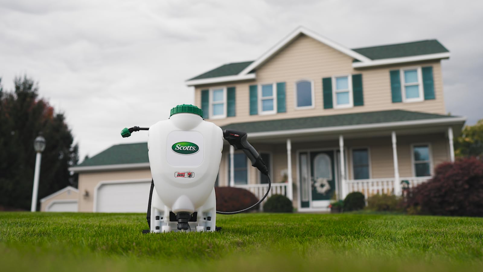 Scotts sprayer in garden use showing efficient fertilizing and weed control application