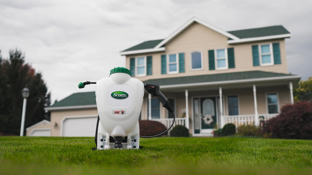 Scotts sprayer in garden use showing efficient fertilizing and weed control application