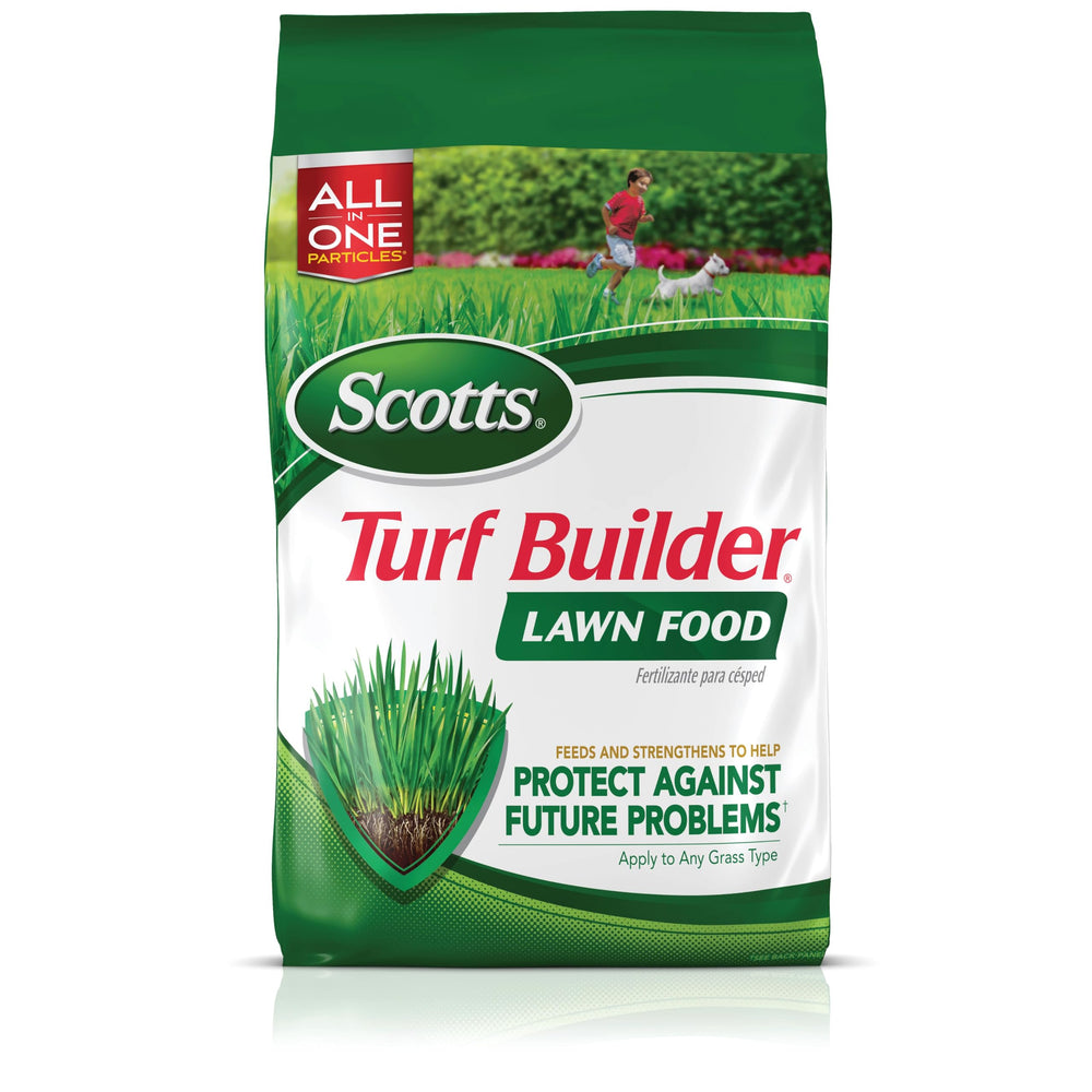 Sweeping Scotts granules from driveway back onto lawn to prevent waste