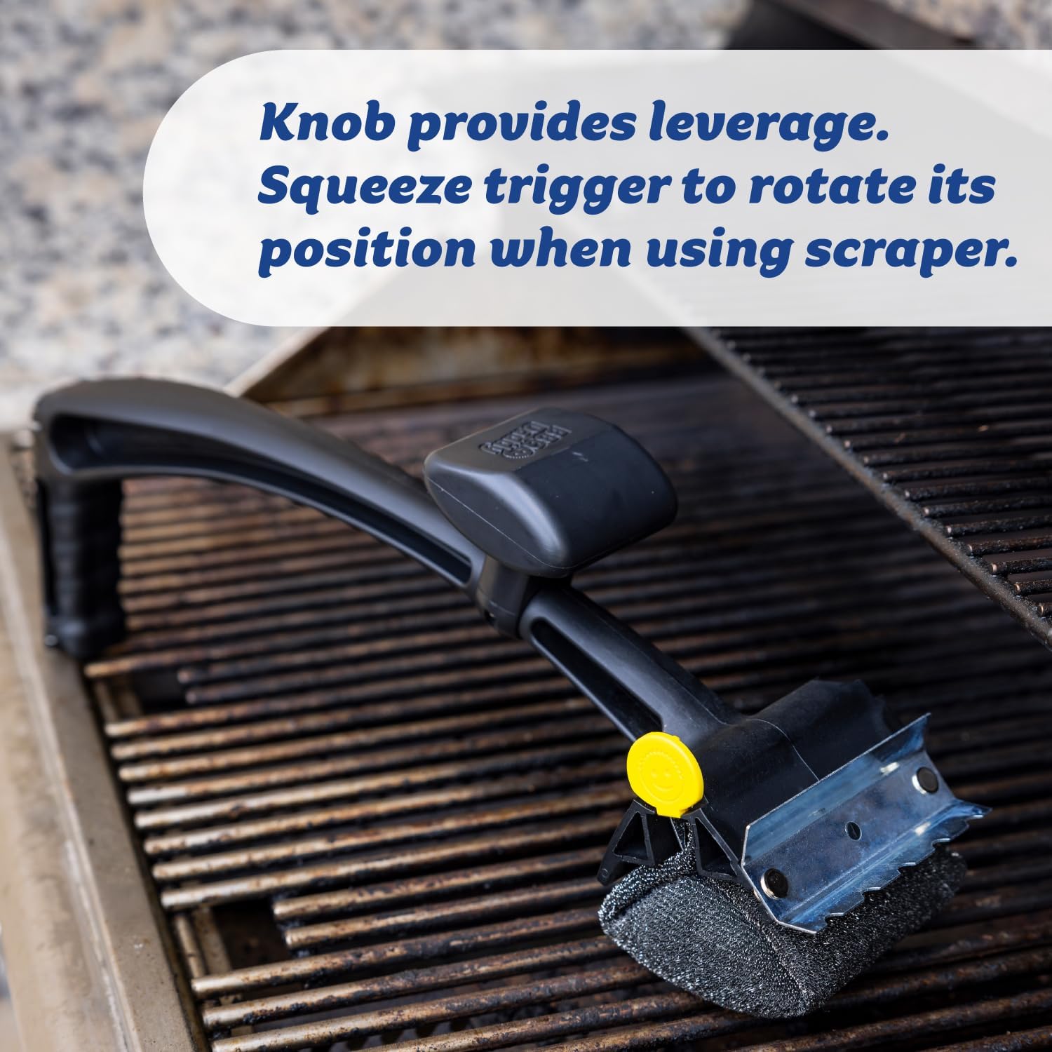 Scrub Daddy metal scraper between grill grates removing char for safer food