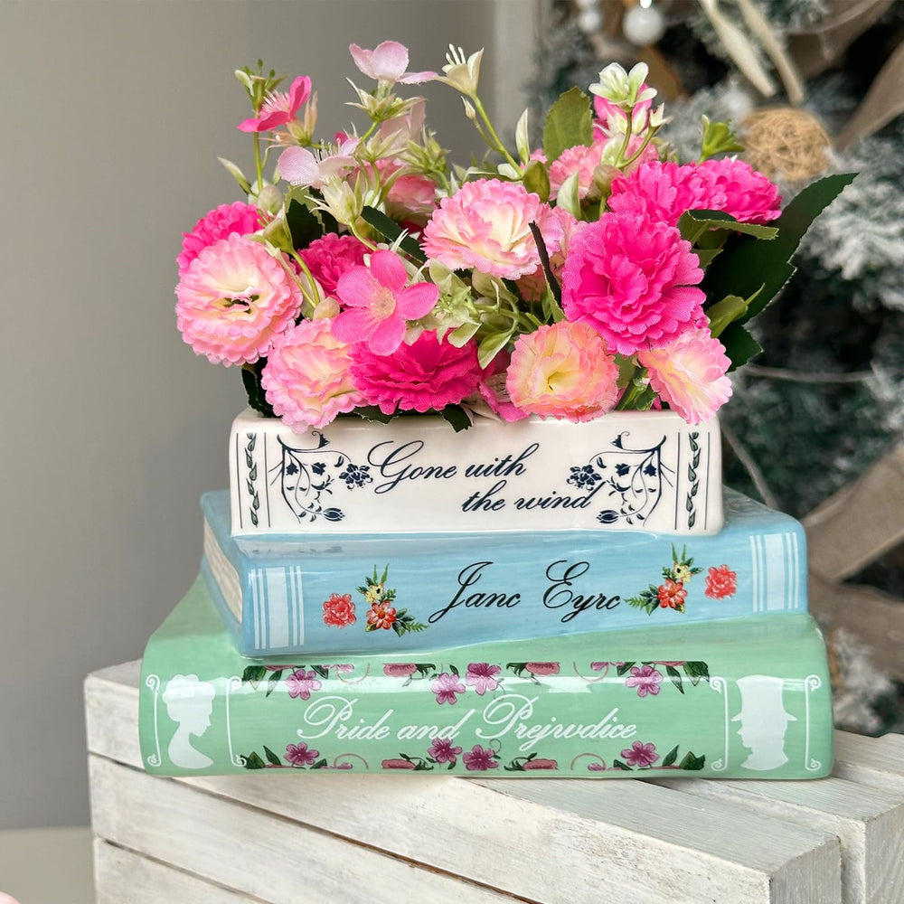 Scuyari vase staged on bookshelf adding literary decor charm benefit