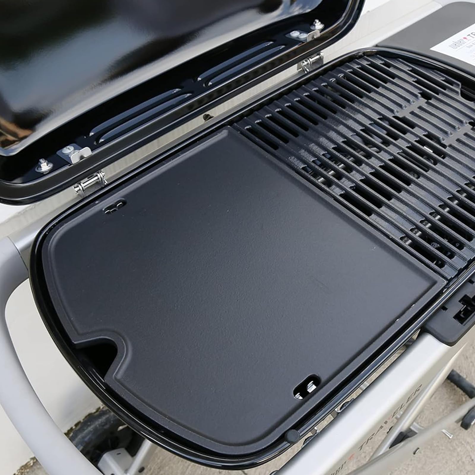 SearCook griddle with burgers and vegetables showing versatile cooking benefit