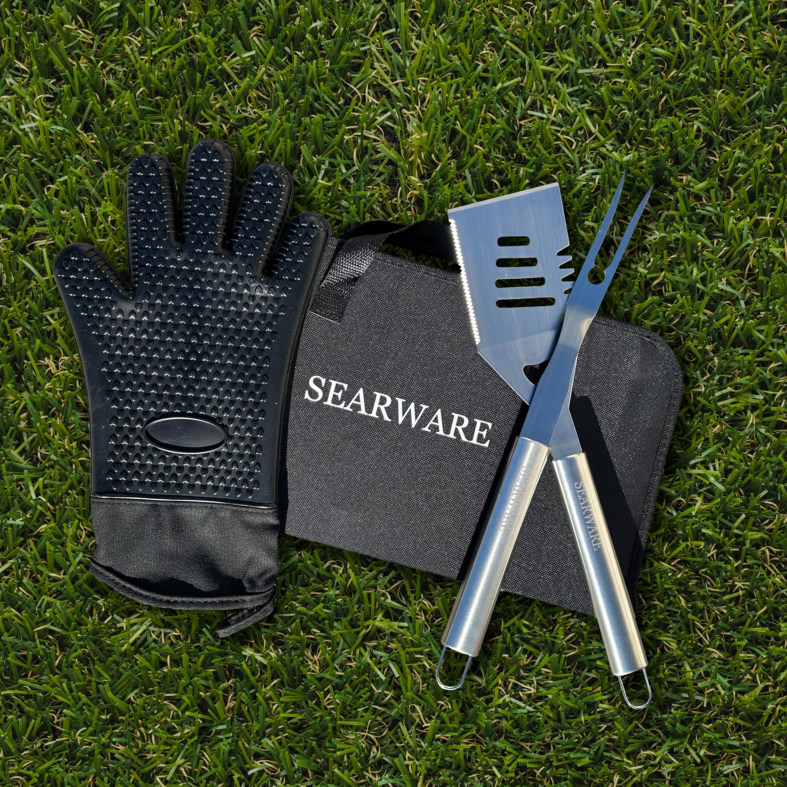 SEARWARE heat-resistant glove on hand handling hot grill safely
