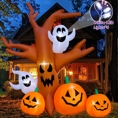 SEASONBLOW dead tree lit at night with LEDs creating festive curb appeal