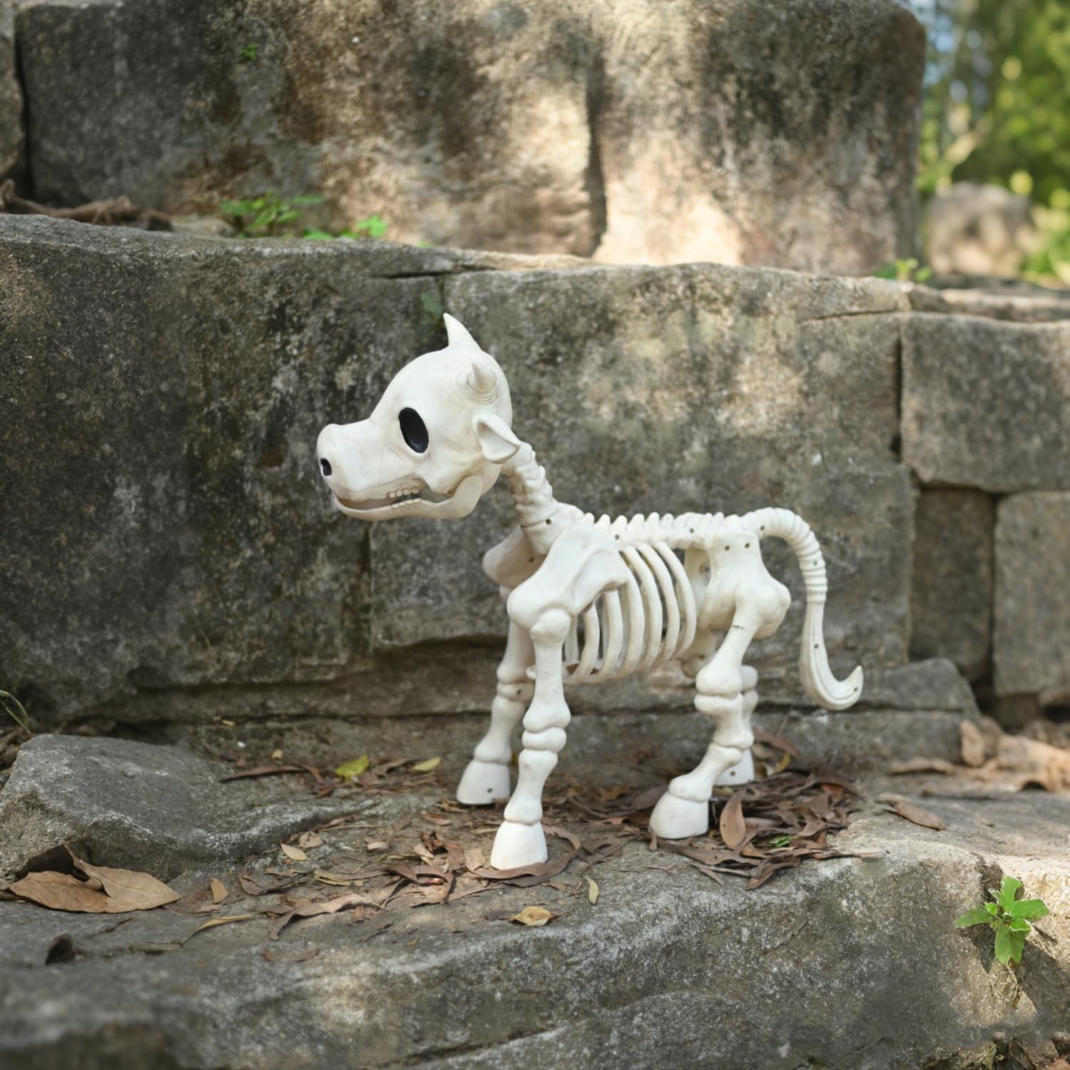 Seasons skeleton cow in haunted barn scene adding atmosphere and thematic continuity