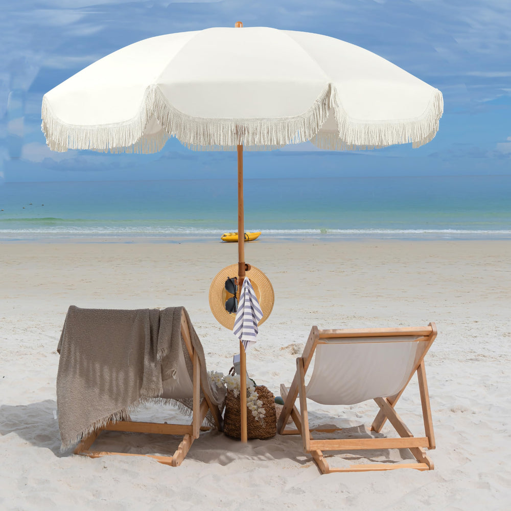 Seazul umbrella on beach near towel and cooler demonstrating lifestyle comfort