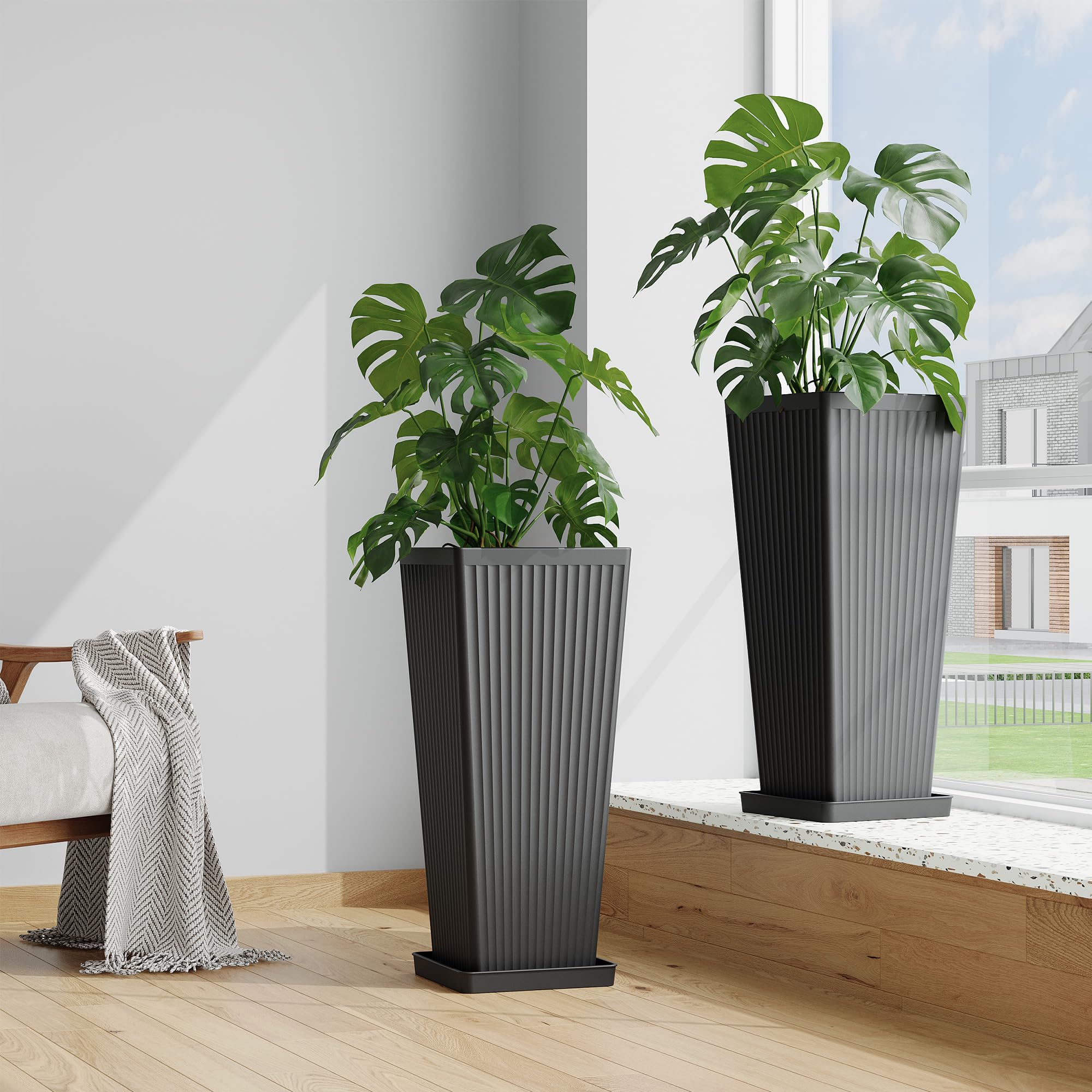 seethmi two matching planters flanking a doorway creating balanced, stylish entry