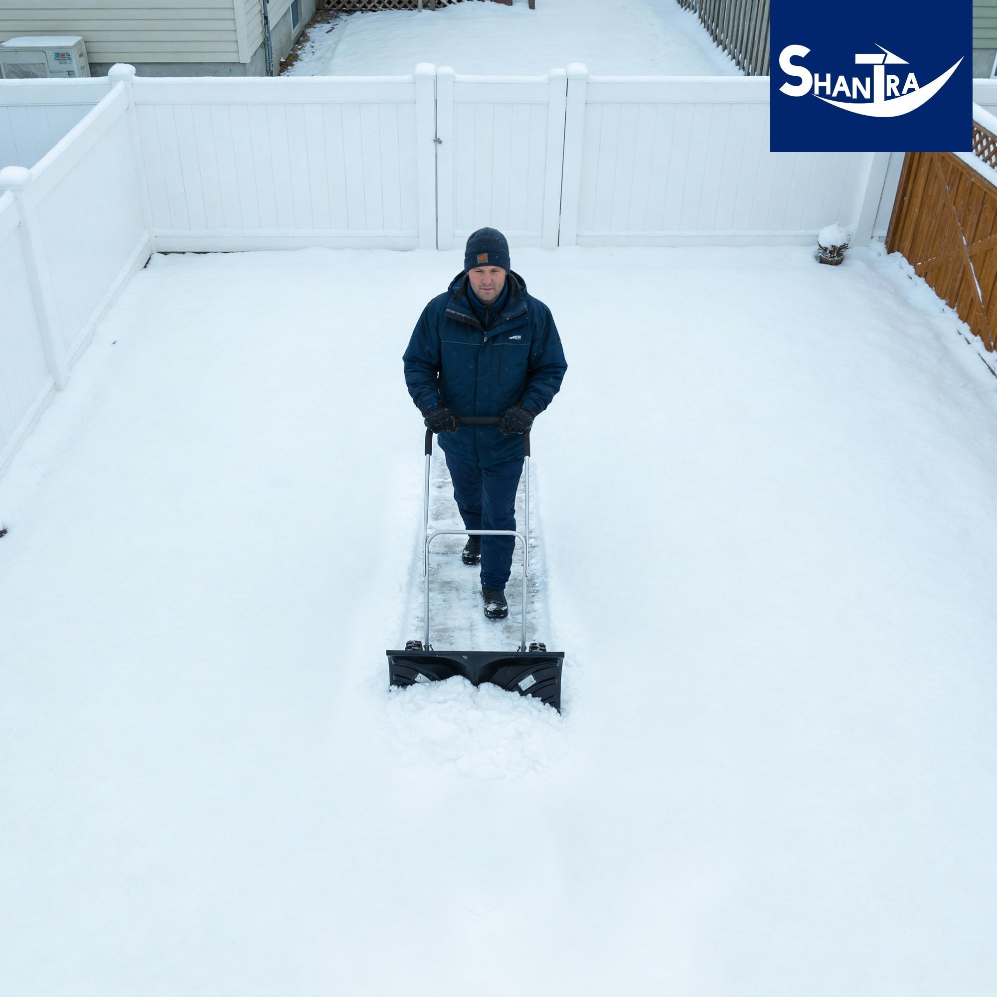 SHANTRA in-use on driveway showing efficient snow clearing with less strain