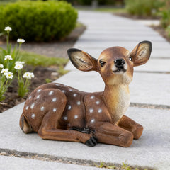SHAODIE fawn placed in flower bed demonstrating outdoor decor enhancement