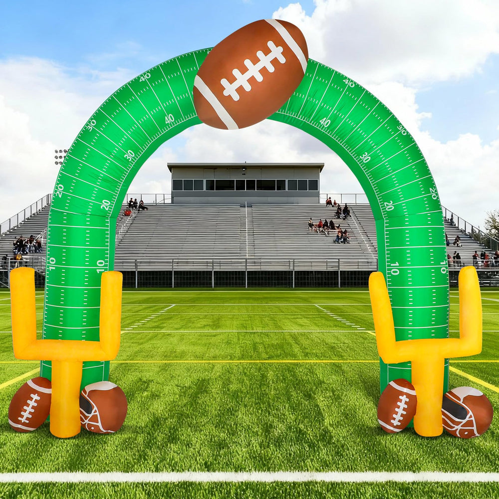 Shappy front view of giant football arch creating game-day entrance