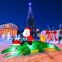Shappy front view of inflatable crocodile showing festive LED lighting and curb appeal