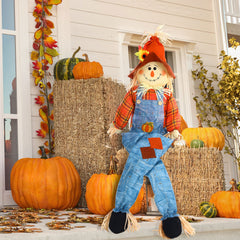 Shappy scarecrow in garden with pumpkins creating festive atmosphere