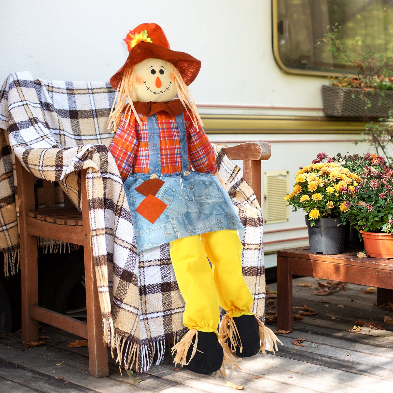 Shappy scarecrow beside a door showing scale and easy porch placement