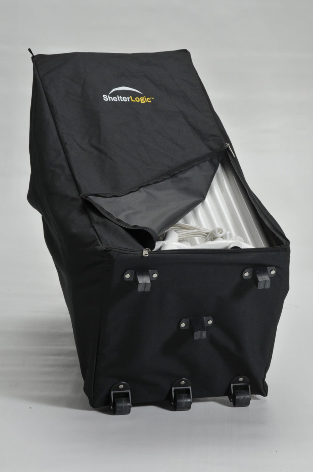 ShelterLogic storage bag in garage saving space and simplifying seasonal change