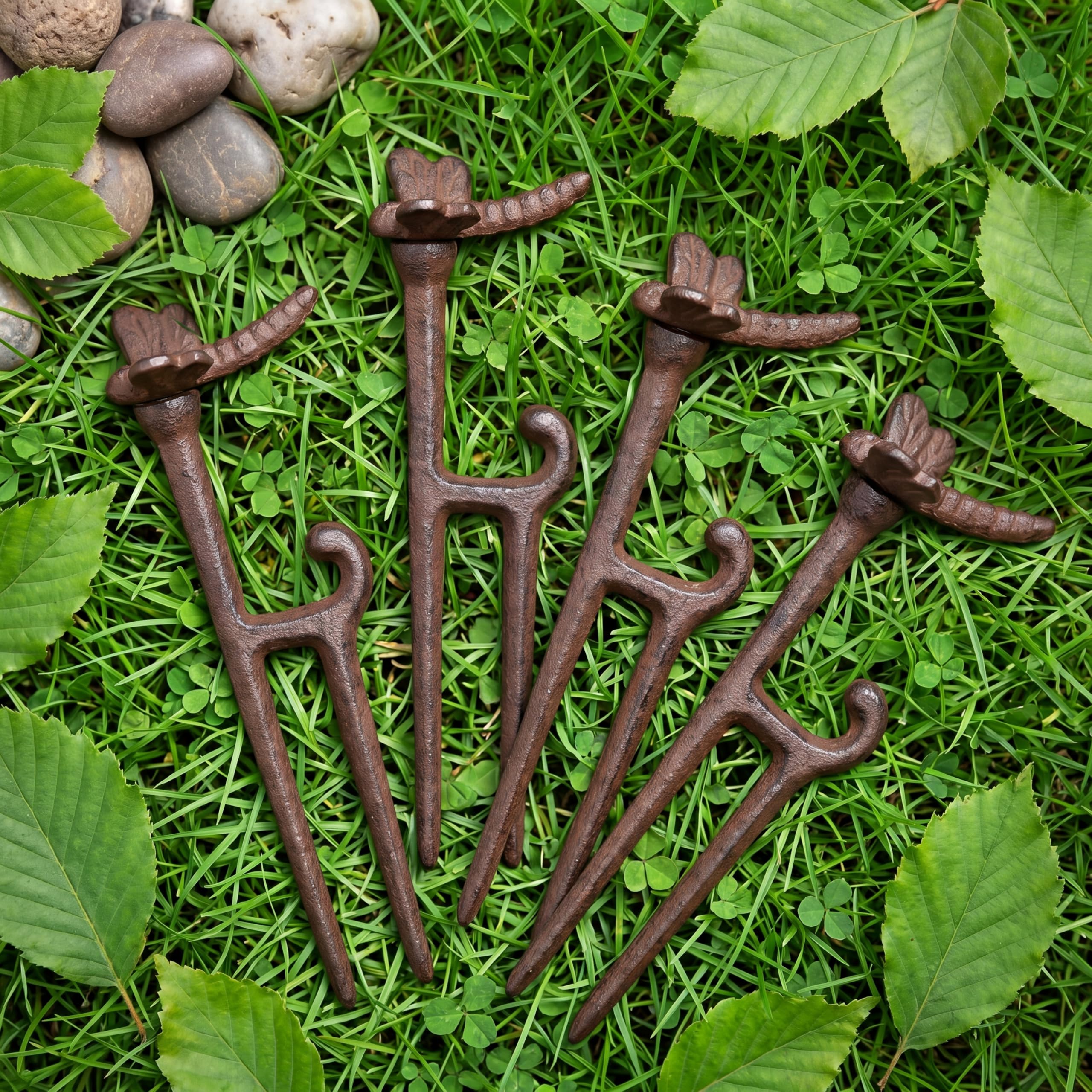 Scale comparison with a hand beside a Shimeyao 9.5-inch stake showing practical height for plant protection